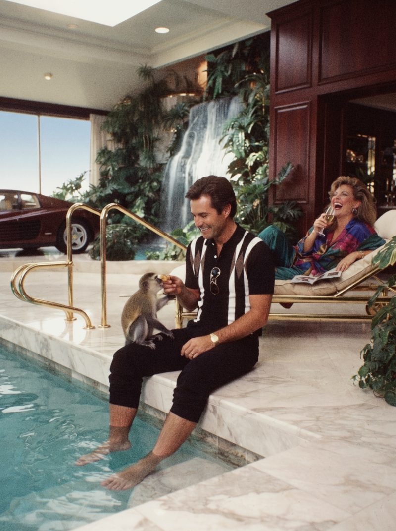 A striped knit polo by the water